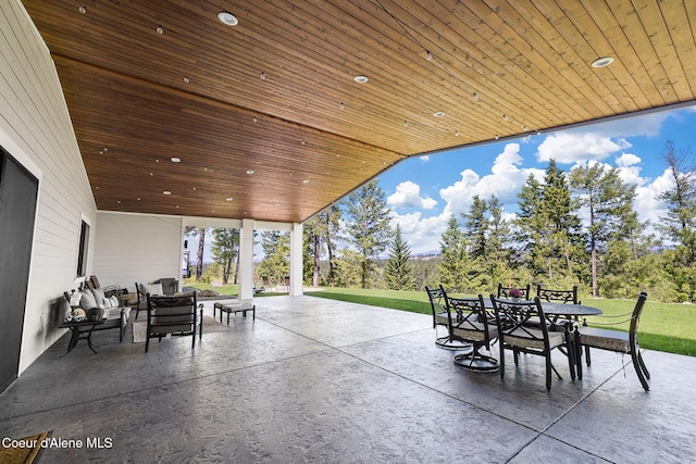 view of patio / terrace featuring an outdoor living space and outdoor dining area