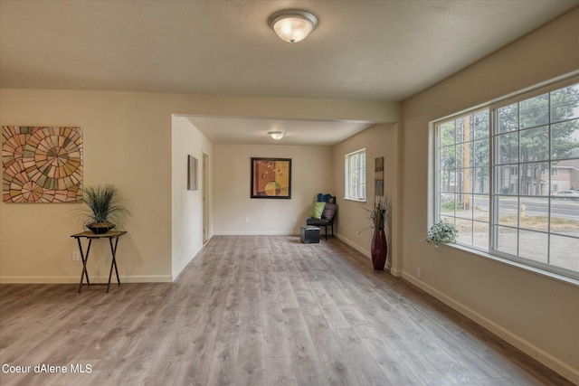 1813 N Spokane St, Post Falls, ID 83854 - unfurnished room featuring wood finished floors and baseboards