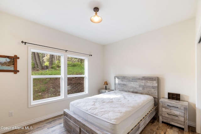 26 Hanaford Rd, Blanchard, ID 83804 - bedroom with wood finished floors and baseboards