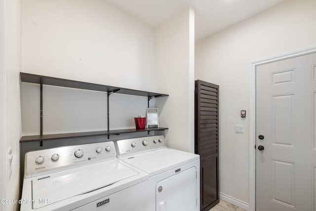 26 Hanaford Rd, Blanchard, ID 83804 - clothes washing area featuring separate washer and dryer and baseboards