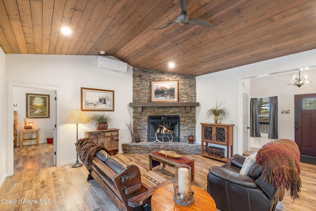 26 Hanaford Rd, Blanchard, ID 83804 - living room featuring a wall unit AC, wooden ceiling, vaulted ceiling, light wood-style floors, and a ceiling fan