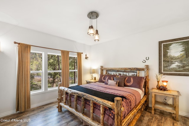 26 Hanaford Rd, Blanchard, ID 83804 - bedroom featuring wood finished floors and baseboards