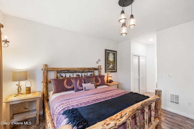 26 Hanaford Rd, Blanchard, ID 83804 - bedroom featuring baseboards, wood finished floors, a closet, and recessed lighting