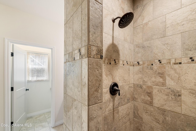 26 Hanaford Rd, Blanchard, ID 83804 - bathroom featuring tiled shower and baseboards