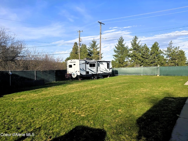 view of yard with a fenced backyard