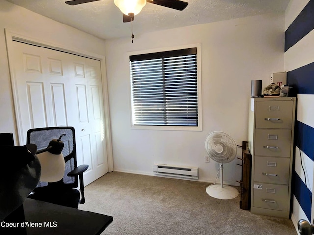 interior space with baseboards, a ceiling fan, carpet flooring, and a baseboard radiator