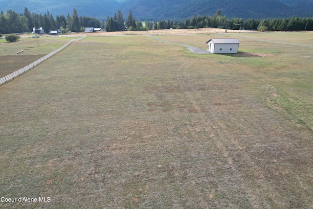 exterior space featuring a rural view and a mountain view