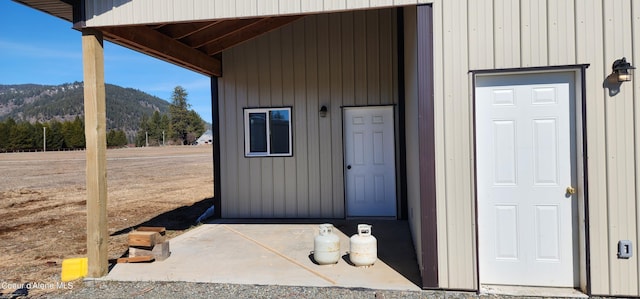 doorway to property with a mountain view