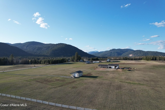 mountain view featuring a rural view
