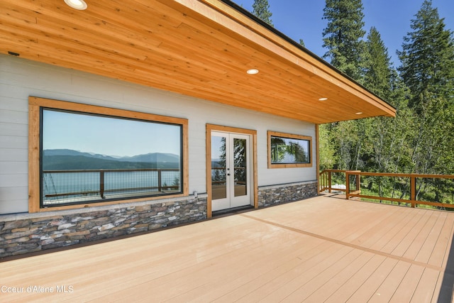 wooden deck featuring french doors