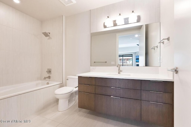 1579 W Riverstone Dr # 306, Coeur Dalene, ID 83814 - full bathroom featuring tile patterned flooring, visible vents, toilet, vanity, and shower / tub combination