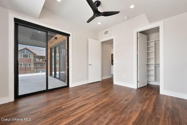 1579 W Riverstone Dr # 306, Coeur Dalene, ID 83814 - unfurnished bedroom featuring wood finished floors, access to exterior, baseboards, and visible vents