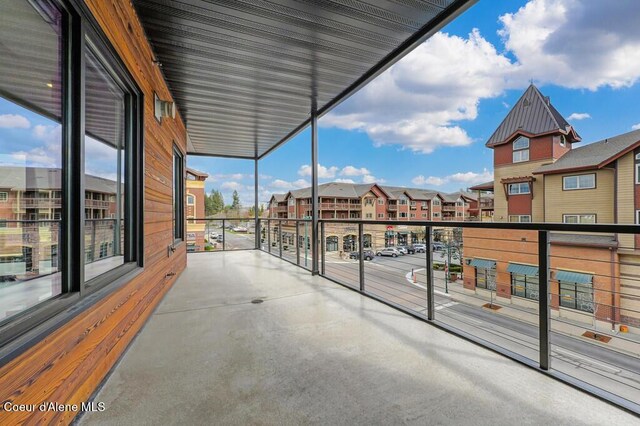 1579 W Riverstone Dr # 306, Coeur Dalene, ID 83814 - balcony featuring a residential view