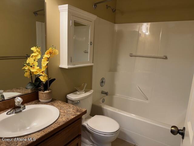 2359 N Alfalfa Loop, Post Falls, ID 83854 - full bathroom with shower / bath combination, vanity, and toilet