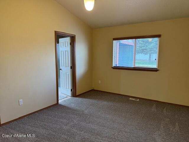 2359 N Alfalfa Loop, Post Falls, ID 83854 - unfurnished room with lofted ceiling, visible vents, and carpet