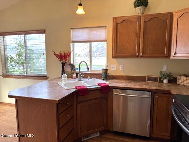 2359 N Alfalfa Loop, Post Falls, ID 83854 - kitchen featuring a wealth of natural light, visible vents, a sink, and appliances with stainless steel finishes