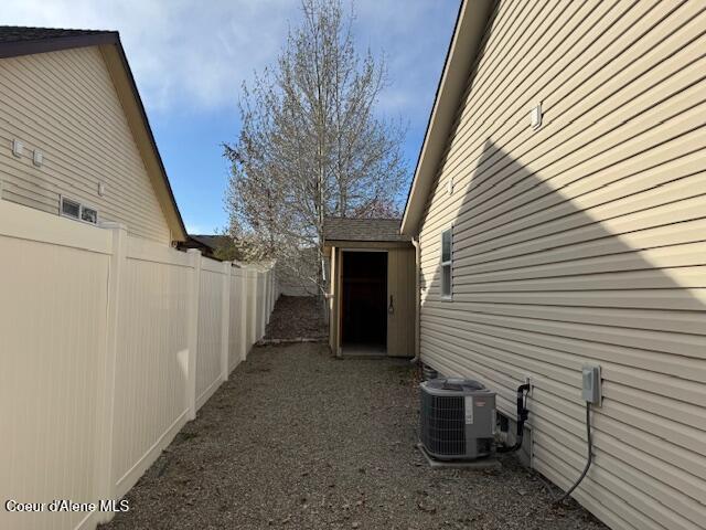 2359 N Alfalfa Loop, Post Falls, ID 83854 - view of property exterior featuring central air condition unit and fence