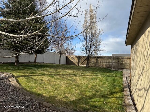 2359 N Alfalfa Loop, Post Falls, ID 83854 - view of yard with a fenced backyard