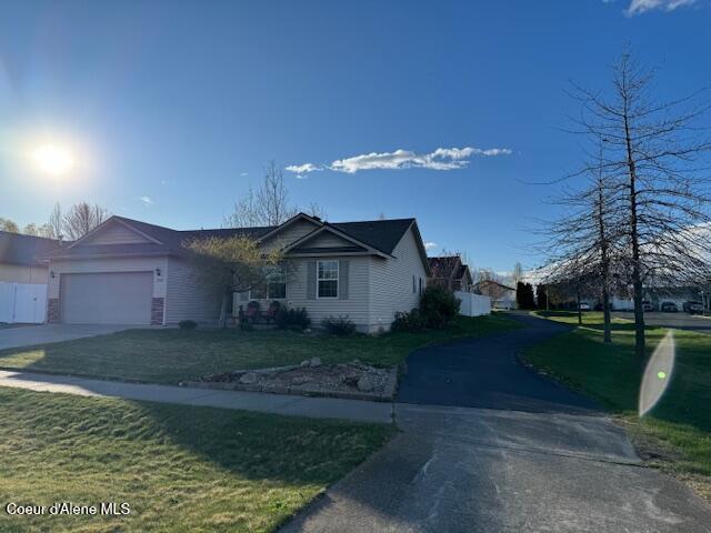 2359 N Alfalfa Loop, Post Falls, ID 83854 - single story home with a garage, a front yard, and concrete driveway