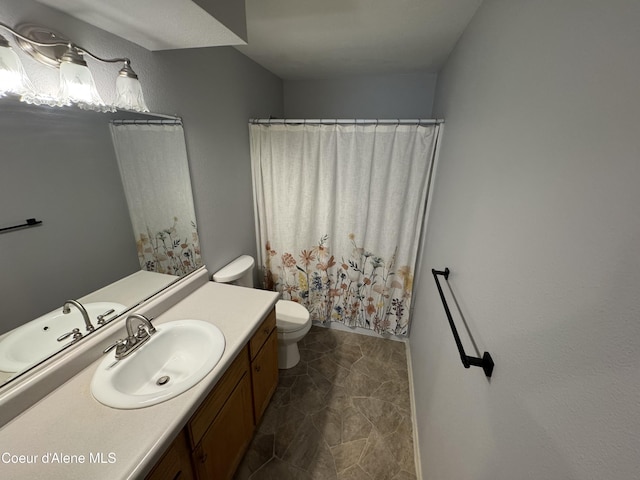 110 W 15th Ave, Post Falls, ID 83854 - full bathroom with vanity, toilet, and a shower with curtain