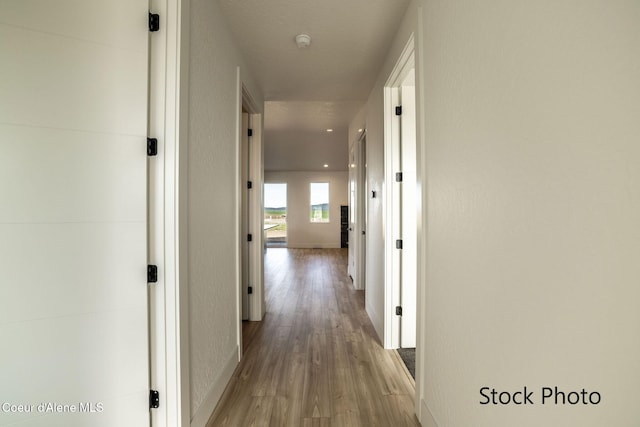 11506 N Clapton Ln, Rathdrum, ID 83858 - hallway featuring wood finished floors and baseboards