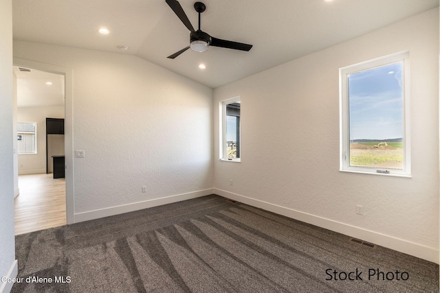 11506 N Clapton Ln, Rathdrum, ID 83858 - spare room featuring a ceiling fan, plenty of natural light, vaulted ceiling, recessed lighting, and baseboards