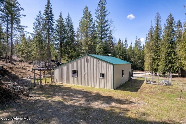 view of outbuilding featuring an outdoor structure