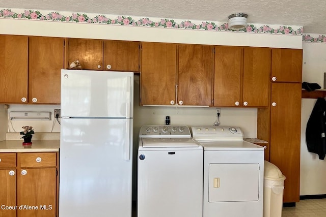 321 High St, Priest River, ID 83856 - clothes washing area with washer and clothes dryer and laundry area