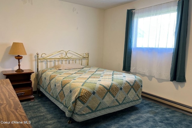 321 High St, Priest River, ID 83856 - carpeted bedroom featuring a baseboard heating unit