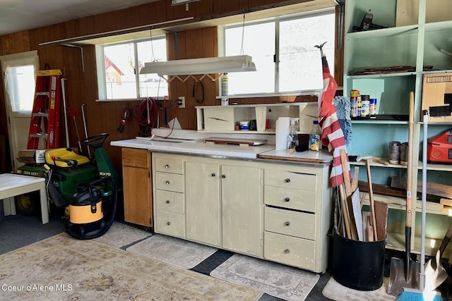 321 High St, Priest River, ID 83856 - kitchen featuring open shelves, wooden walls, and light countertops