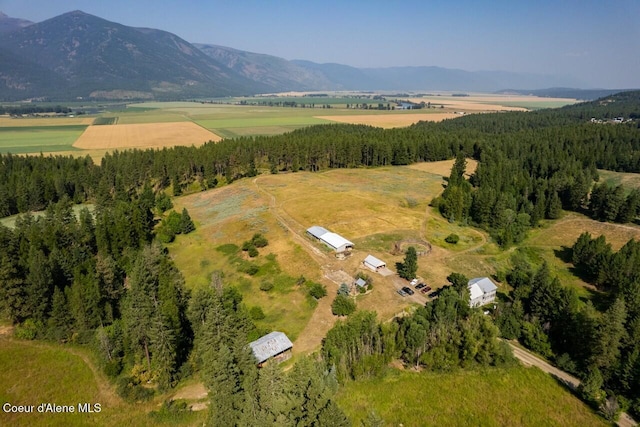 drone / aerial view featuring a rural view and a mountain view