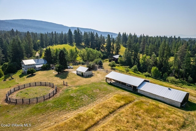 bird's eye view with a rural view and a forest view