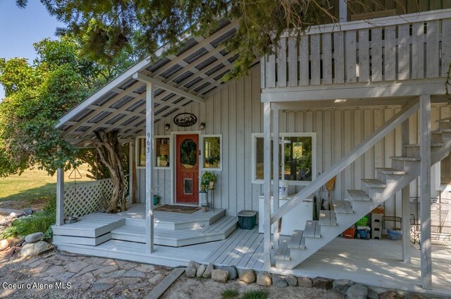 property entrance with board and batten siding