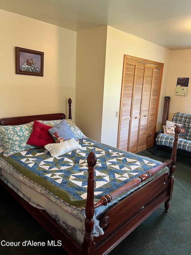 bedroom with a closet and carpet