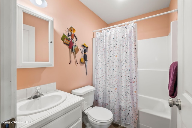 full bathroom featuring vanity, toilet, and shower / bathtub combination with curtain