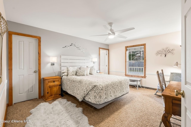 bedroom featuring light carpet and ceiling fan