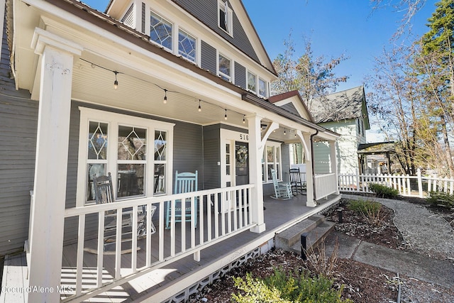 516 E Indiana Ave, Coeur Dalene, ID 83814 - view of property exterior with a porch