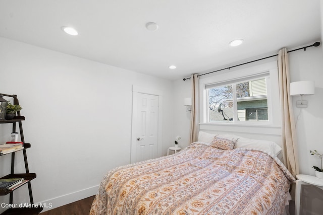 516 E Indiana Ave, Coeur Dalene, ID 83814 - bedroom with baseboards, recessed lighting, and dark wood finished floors