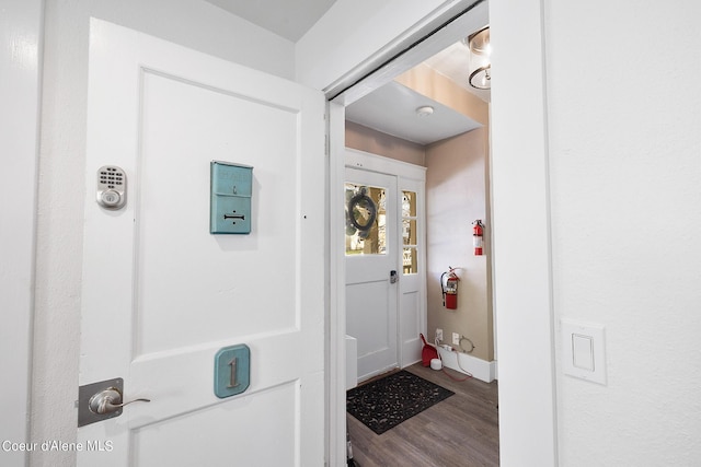 516 E Indiana Ave, Coeur Dalene, ID 83814 - doorway to outside featuring wood finished floors and baseboards