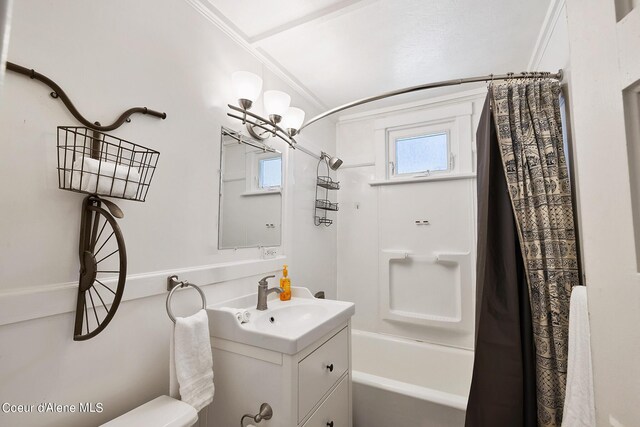 516 E Indiana Ave, Coeur Dalene, ID 83814 - bathroom with shower / bath combo, toilet, ornamental molding, and vanity
