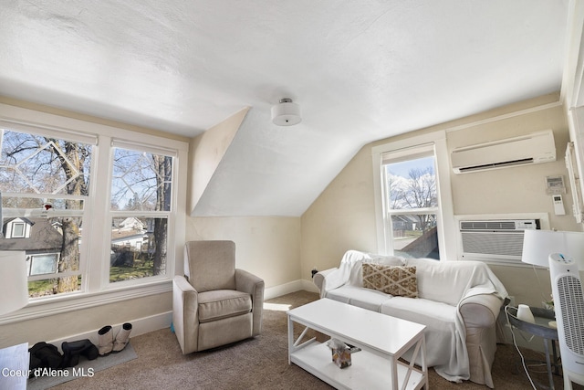 516 E Indiana Ave, Coeur Dalene, ID 83814 - sitting room with a wall mounted AC, plenty of natural light, carpet flooring, and vaulted ceiling