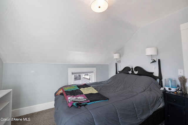 516 E Indiana Ave, Coeur Dalene, ID 83814 - carpeted bedroom featuring lofted ceiling and baseboards
