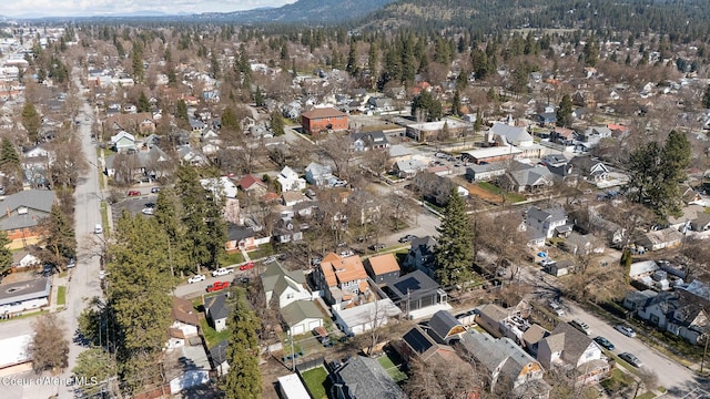 516 E Indiana Ave, Coeur Dalene, ID 83814 - birds eye view of property with a residential view, a view of trees, and a mountain view