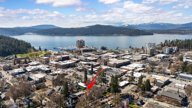 516 E Indiana Ave, Coeur Dalene, ID 83814 - drone / aerial view featuring a water and mountain view