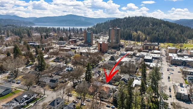 516 E Indiana Ave, Coeur Dalene, ID 83814 - drone / aerial view featuring a forest view and a mountain view