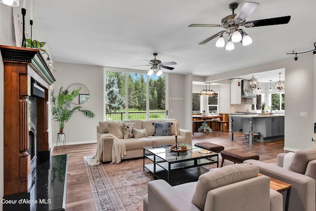 3825 E English Point Rd, Hayden, ID 83835 - living room featuring wood finished floors and ceiling fan