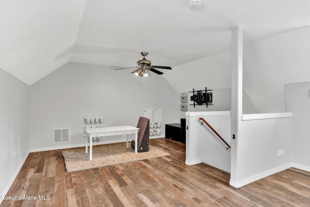 3825 E English Point Rd, Hayden, ID 83835 - additional living space featuring vaulted ceiling, wood finished floors, and a ceiling fan