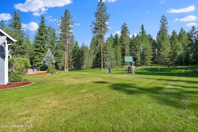 3825 E English Point Rd, Hayden, ID 83835 - view of grassy yard featuring a playground