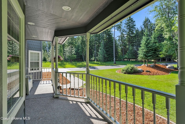 3825 E English Point Rd, Hayden, ID 83835 - porch featuring a lawn
