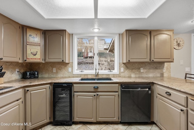 kitchen featuring wine cooler, light countertops, backsplash, dishwashing machine, and a sink